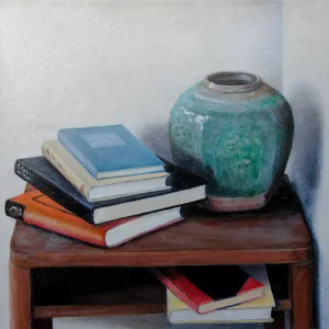 Stilleven met gemberpot en boeken op tafel